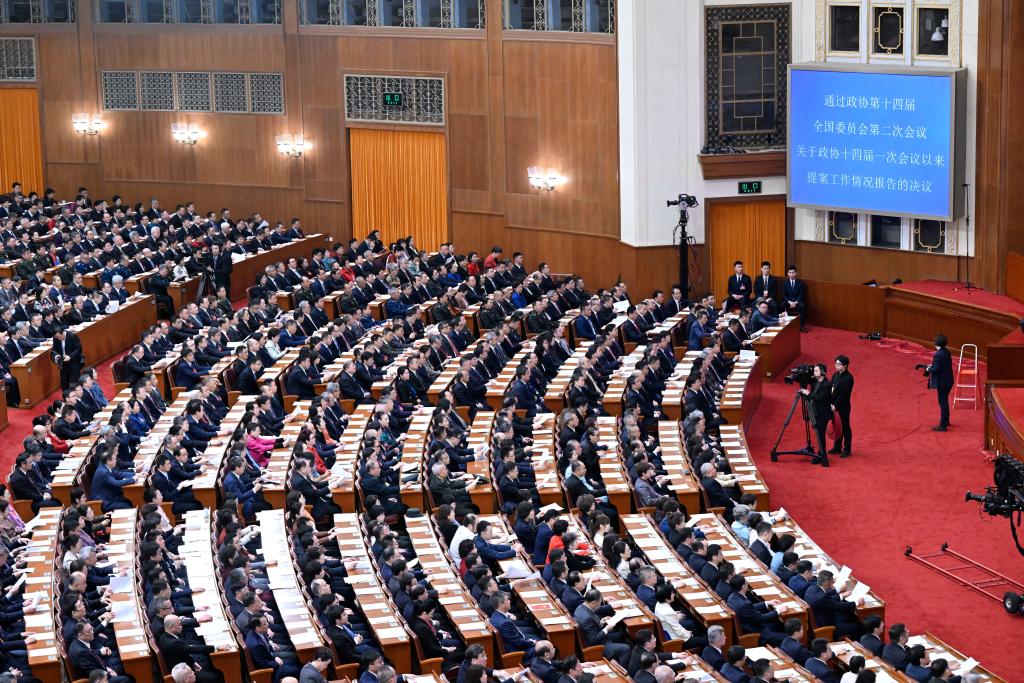 3月10日，中國人民政治協商會議第十四屆全國委員會第二次會議在北京人民大會堂舉行閉幕會。新華社記者 申宏 攝