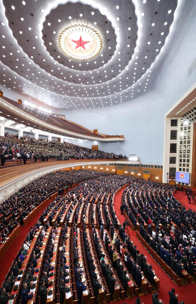 3月11日，第十四屆全國人民代表大會第二次會議在北京人民大會堂舉行閉幕會。新華社記者 丁林 攝